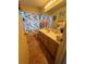 Bathroom boasts a shower/tub combo, floral shower curtain and vanity at 105 Cattail Ct, Kissimmee, FL 34743