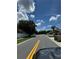 Street view of neighborhood showing well-maintained lawns at 105 Cattail Ct, Kissimmee, FL 34743