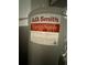 Water heater specifications and manufacture data clearly displayed on a sticker at 105 Cattail Ct, Kissimmee, FL 34743