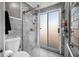 Contemporary bathroom with glass shower, modern fixtures, and ceramic tile at 1432 Mollie Rd, Daytona Beach, FL 32114