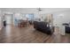Spacious living room with luxury vinyl flooring and an open concept layout to kitchen at 1432 Mollie Rd, Daytona Beach, FL 32114