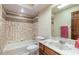 Bathroom with tub/shower combo and marbled vanity at 206 Sage Brush Trl, Ormond Beach, FL 32174