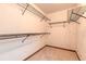 Empty walk-in closet featuring carpeted floor and wire shelving ready for organization at 206 Sage Brush Trl, Ormond Beach, FL 32174