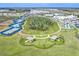 Featuring neighborhood park with tennis, bocce, and outdoor seating under shady palapas at 251 Island Breeze Ave, Daytona Beach, FL 32124
