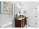 Bathroom featuring a single vanity with granite countertops and decorative seahorse decor at 251 Island Breeze Ave, Daytona Beach, FL 32124