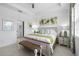 Cozy bedroom with tropical-themed decor, a king bed, and bedside tables at 251 Island Breeze Ave, Daytona Beach, FL 32124