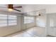 Bedroom with ceiling fan, mirrored closet doors, and natural light at 30 Azalea Dr, Ormond Beach, FL 32176
