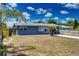 Charming single-story home with a well-maintained yard, a concrete driveway, and mature landscaping at 30 Azalea Dr, Ormond Beach, FL 32176