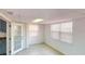 Bright room with natural light, tile floors, and a door to the outside at 30 Azalea Dr, Ormond Beach, FL 32176