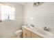 Bathroom featuring tile walls and a double vanity at 322 Garden St, Daytona Beach, FL 32114