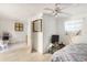 Bedroom featuring tiled flooring, neutral paint, and easy access to kitchen at 322 Garden St, Daytona Beach, FL 32114