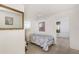 Bedroom features neutral paint, tiled flooring, and natural light at 322 Garden St, Daytona Beach, FL 32114