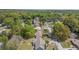 Overhead shot of houses and greenery, displaying a peaceful neighborhood setting at 3385 Ne 44Th Pl, Ocala, FL 34479