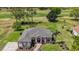 Beautiful single story home overlooking the golf course with mature trees and lush landscaping at 39601 Harbor Hills Blvd, Lady Lake, FL 32159