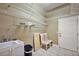 Functional laundry room with sink, storage shelves, and utility sink at 39601 Harbor Hills Blvd, Lady Lake, FL 32159