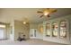 Large covered patio area with ceiling fans, offering an excellent space for outdoor activities at 39601 Harbor Hills Blvd, Lady Lake, FL 32159