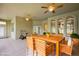 Covered patio with plenty of space for dining and relaxation furniture at 39601 Harbor Hills Blvd, Lady Lake, FL 32159