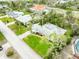 A lush, expansive yard surrounds this home, with mature trees providing ample shade and privacy, complemented by a well-maintained lawn at 59 Amsden Rd, Ormond Beach, FL 32176