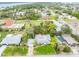 Charming single-story home featuring a well-manicured lawn, mature trees, and convenient street access at 59 Amsden Rd, Ormond Beach, FL 32176
