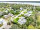 This property offers a beautifully landscaped yard with mature trees, providing shade and privacy in a serene neighborhood setting at 59 Amsden Rd, Ormond Beach, FL 32176