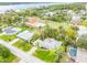 The property boasts lush greenery, mature trees, and a tranquil neighborhood setting with convenient access to the nearby waterfront at 59 Amsden Rd, Ormond Beach, FL 32176