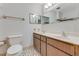 Bathroom view of the double vanity, mirror and toilet at 59 Amsden Rd, Ormond Beach, FL 32176