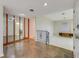 Spacious living room with a large mirrored wall and stone flooring entryway at 59 Amsden Rd, Ormond Beach, FL 32176