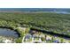 Charming waterfront homes in a serene location with beautiful lake views at 6172 Knotty Pine Ct, Port Orange, FL 32127