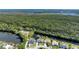 Charming waterfront homes in a serene location with beautiful lake views at 6172 Knotty Pine Ct, Port Orange, FL 32127