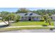 Charming single-Gathering home with well-manicured lawn, mature landscaping, and inviting curb appeal at 6172 Knotty Pine Ct, Port Orange, FL 32127