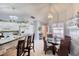 Charming breakfast nook with seating area, bright lighting, and bar top seating at 6172 Knotty Pine Ct, Port Orange, FL 32127