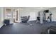 Gym area offering weights, weight machines, exercise equipment, and outside access at 1010 Megano Blvd, Deland, FL 32724