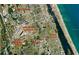 Aerial view showing proximity of Daytona International Speedway, Tanger Outlets, and the ocean at 1433 Mollie Rd, Daytona Beach, FL 32114
