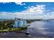 Beautiful aerial view of waterfront condos with docks, and city skyline at 925 N Halifax Ave # 1105, Daytona Beach, FL 32118
