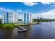 Beautiful aerial view of waterfront condos with docks, and bridge at 925 N Halifax Ave # 1105, Daytona Beach, FL 32118