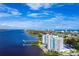 Beautiful aerial view of waterfront condo community with boat docks and city skyline at 925 N Halifax Ave # 1105, Daytona Beach, FL 32118