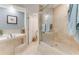 This bathroom has a soaking tub next to a glass enclosed standing shower at 925 N Halifax Ave # 1105, Daytona Beach, FL 32118