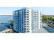 Condominium building featuring balconies, offering picturesque waterfront views and proximity to tennis at 925 N Halifax Ave # 1105, Daytona Beach, FL 32118