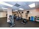 Community gym and fitness center featuring a variety of cardio machines and free weights at 925 N Halifax Ave # 1105, Daytona Beach, FL 32118