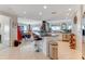 Spacious kitchen with tile floors and stainless steel appliances and black granite countertop at 925 N Halifax Ave # 1105, Daytona Beach, FL 32118