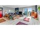 Comfortable living room with a sliding glass door and a balcony that offers plenty of natural light at 925 N Halifax Ave # 1105, Daytona Beach, FL 32118