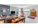 Cozy living room featuring a large window and sliding glass door providing ample natural light at 925 N Halifax Ave # 1105, Daytona Beach, FL 32118