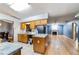 Kitchen with a view to the large open concept living room with fireplace at 230 Katrina St # 230, De Leon Springs, FL 32130