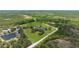 Wide-open acreage featuring outbuildings, residential homes, and road frontage at 1060 Still Rd, Pierson, FL 32180