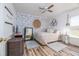 Charming bedroom with a decorative brick accent wall and stylish furnishings at 1060 Still Rd, Pierson, FL 32180