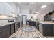 Bright kitchen with stainless steel appliances, marble countertops, and hardwood floors at 1060 Still Rd, Pierson, FL 32180