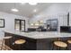 Modern kitchen featuring an island with seating, stainless steel appliances, and ample counter space at 1060 Still Rd, Pierson, FL 32180