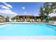 Inviting backyard pool with surrounding patio and furniture, perfect for summer relaxation at 1060 Still Rd, Pierson, FL 32180