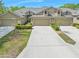 Beautiful townhomes featuring attached garages, manicured landscaping and neutral color palette at 1128 Hansberry Ct, Ormond Beach, FL 32174