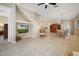 Spacious living area seamlessly connects to the dining area, kitchen and outdoor porch at 1128 Hansberry Ct, Ormond Beach, FL 32174